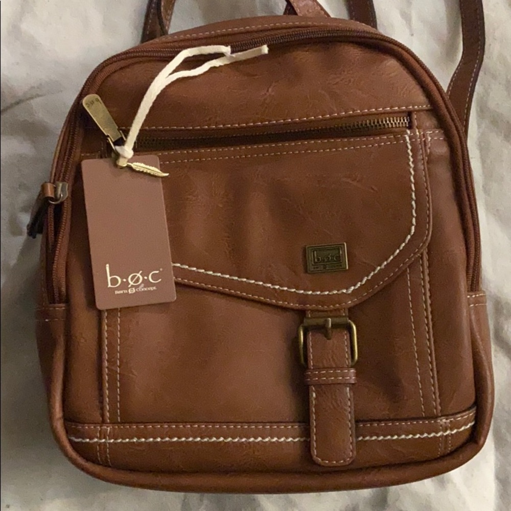 Back pack with 3 zipper 1 extra pocket with belt